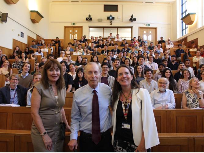 a photo of carol robinson, robert langer and molly stevens during the lecture.