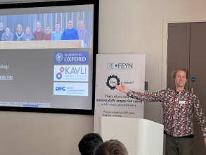 Photo of Emanuel Pfiztner doing a presentation at the mass photometry event.